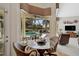 View from inside looking out onto the pool and spa in the screened lanai at 2111 Muskogee Trl, Nokomis, FL 34275