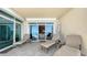 Relax on this spacious balcony overlooking the ocean with comfortable lounge chairs at 2185 Gulf Of Mexico Dr # 243, Longboat Key, FL 34228