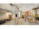 Bright and spacious kitchen with granite countertops, modern appliances, and ample storage at 2185 Gulf Of Mexico Dr # 243, Longboat Key, FL 34228