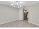 Bright, open space combines kitchen and dining area with modern light fixture at 2319 Beneva Ter # 2284, Sarasota, FL 34232