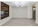 A kitchen view from the dining area, showcasing stainless steel refrigerator at 2319 Beneva Ter # 2284, Sarasota, FL 34232
