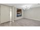 An open-concept living room with tile floors, bright lighting, and a large window at 2319 Beneva Ter # 2284, Sarasota, FL 34232