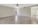 Spacious living room with tile flooring, a ceiling fan, neutral paint and natural light at 2319 Beneva Ter # 2284, Sarasota, FL 34232