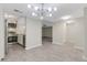 Spacious and well-lit living space that connects the kitchen, dining, and hallway at 2319 Beneva Ter # 2284, Sarasota, FL 34232