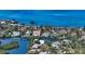 Prime waterfront property with expansive water views, lush greenery, and serene surroundings at 244 Cedar Park Cir, Sarasota, FL 34242