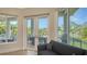 Sitting area with access to a balcony with a water view at 244 Cedar Park Cir, Sarasota, FL 34242