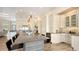 Expansive kitchen with island seating, stainless appliances, and ample counter space that is ideal for entertaining or preparing meals at 244 Cedar Park Cir, Sarasota, FL 34242