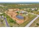Lush acreage with a pond, large estate home, barn, and fenced pastures, ideal for equestrian pursuits at 24705 83Rd E Ave, Myakka City, FL 34251