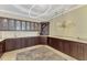 Stylish bar area boasts custom cabinetry, granite countertops, and ample storage space at 24705 83Rd E Ave, Myakka City, FL 34251