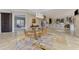 Bright dining area open to the kitchen and living room creating a seamless transition for entertaining and daily living at 24705 83Rd E Ave, Myakka City, FL 34251