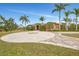 Circular driveway with stone inlay leads to this stately single-story home at 24705 83Rd E Ave, Myakka City, FL 34251