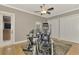 Spacious exercise room with hardwood floors, ceiling fan, and a variety of workout equipment at 24705 83Rd E Ave, Myakka City, FL 34251