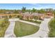 Estate home featuring a circular driveway, well-maintained grounds, and serene landscaping at 24705 83Rd E Ave, Myakka City, FL 34251