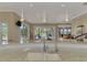 Kitchen sink with bar top counters and an expansive view of the outdoor living space at 24705 83Rd E Ave, Myakka City, FL 34251