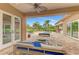 Beautiful pool and patio area with outdoor seating and lush landscaping at 24705 83Rd E Ave, Myakka City, FL 34251