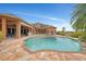Beautiful pool and spa with an expansive patio, perfect for outdoor entertaining and relaxation at 24705 83Rd E Ave, Myakka City, FL 34251