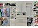 Custom walk-in closet with lots of shelves and drawers for clothing and accessories, maximizing space and organization at 24705 83Rd E Ave, Myakka City, FL 34251