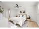 Bright bedroom with neutral colors, modern decor, and ample natural light at 2720 Pinewood Ct, Clearwater, FL 33761
