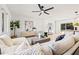 Open concept living room with neutral furniture and modern decor throughout at 2720 Pinewood Ct, Clearwater, FL 33761