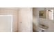 Bathroom features tile flooring, tiled shower, sink, mirror, and tiled walls at 2723 59Th St, Sarasota, FL 34243