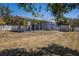 Exterior view of the quonset style workshop and covered carport in the backyard of the home at 2723 59Th St, Sarasota, FL 34243