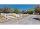 Lovely single-story home with white picket fence surrounded by greenery at 2723 59Th St, Sarasota, FL 34243