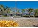 Spacious single-story home with a long driveway and beautiful mature trees at 2723 59Th St, Sarasota, FL 34243