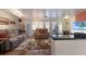 Comfortable living room featuring a ceiling fan and access to the outside at 2723 59Th St, Sarasota, FL 34243