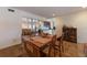 Charming open-concept living and dining area with tile flooring and abundant natural light at 2723 59Th St, Sarasota, FL 34243