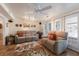 Inviting living room with a ceiling fan, and access to the backyard at 2723 59Th St, Sarasota, FL 34243