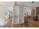Open living space with kitchen and a doorway to a front room at 2723 59Th St, Sarasota, FL 34243