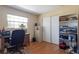 Bright office space with a large window and built-in shelving at 2723 59Th St, Sarasota, FL 34243