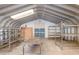 Interior of the metal workshop showing the exposed beam ceiling and concrete flooring at 2723 59Th St, Sarasota, FL 34243