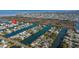 Expansive aerial view of waterfront homes along winding canals, offering serene coastal living at 3416 Crape Myrtle Dr, Hernando Beach, FL 34607