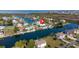 Stunning aerial view of a coastal home situated on a waterfront property with serene waterways at 3416 Crape Myrtle Dr, Hernando Beach, FL 34607