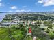 Aerial view showcases community near waterway and town at 3608 Water St, Ellenton, FL 34222
