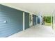 Covered carport with access to the house at 3608 Water St, Ellenton, FL 34222
