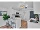 Modern white kitchen features sleek breakfast bar and stainless appliances at 3608 Water St, Ellenton, FL 34222
