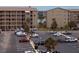 Exterior view of a large parking lot surrounded by residential buildings at 3744 Lake Bayshore Dr # K-503, Bradenton, FL 34205