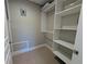Walk-in closet with carpet, white walls, and white shelving at 3744 Lake Bayshore Dr # K-503, Bradenton, FL 34205