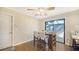 Cozy dining area adjacent to kitchen with patio access and sliding glass door at 3761 Countryside Rd, Sarasota, FL 34233