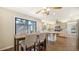Bright kitchen features stone countertops, stainless appliances, and a cozy eat-in kitchen with a beautiful outdoor view at 3761 Countryside Rd, Sarasota, FL 34233