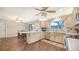 Spacious kitchen with stainless steel appliances, custom cabinets and a breakfast bar at 3761 Countryside Rd, Sarasota, FL 34233