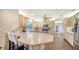 Bright kitchen with custom cabinets, stainless steel appliances, and a breakfast bar at 3761 Countryside Rd, Sarasota, FL 34233