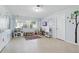 Playroom space featuring a colorful rug, playful wall decor, and a variety of toys at 3941 Pin Oaks St, Sarasota, FL 34232