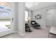 Comfortable living room with stylish decor and modern furnishings by the front door at 4008 Antelope Ter, North Port, FL 34286