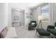 Cozy living room with modern decor, light-colored floors, and stylish furniture at 4008 Antelope Ter, North Port, FL 34286