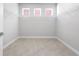 Spacious walk-in closet with ample shelving and storage space with natural light at 4008 Antelope Ter, North Port, FL 34286