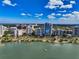 Breathtaking aerial view of a city skyline along the waterfront, complete with lush greenery at 4307 Camino Real, Sarasota, FL 34231