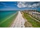 Overhead view of beachfront condos offering stunning ocean views and easy access to the beach at 4307 Camino Real, Sarasota, FL 34231